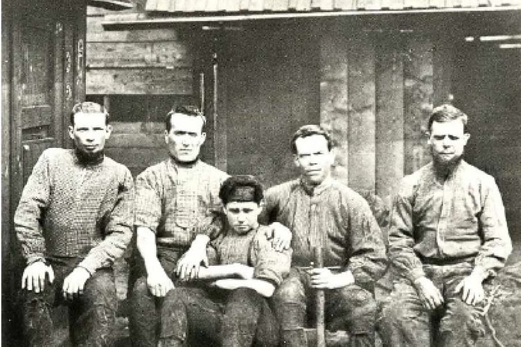 Can you guess the men in this week’s Mystery Photograph?