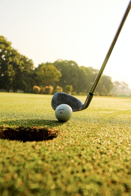 Playing golf on a summer’s day.