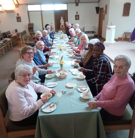 Parishioners at St Joseph’s Catholic Church in Peasedown St John sit down for a lunch to raise money for St Joseph’s Church in Zimbabwe.