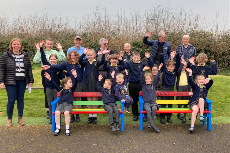 Stoke St. Michael Nursery and Primary School celebrating their new buddy benches thanks to Midsomer Norton Men’s Shed.