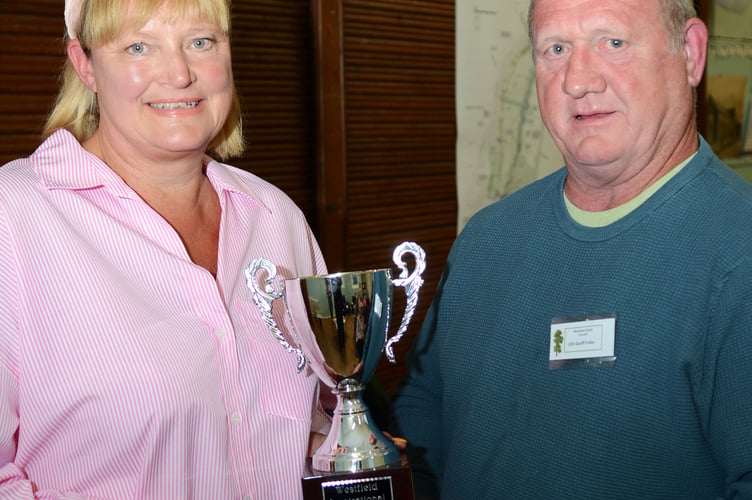 Chair of Westfield Parish Council Geoff Fuller presents the Inspirational Citizen Award to Rachael Liddiard. 