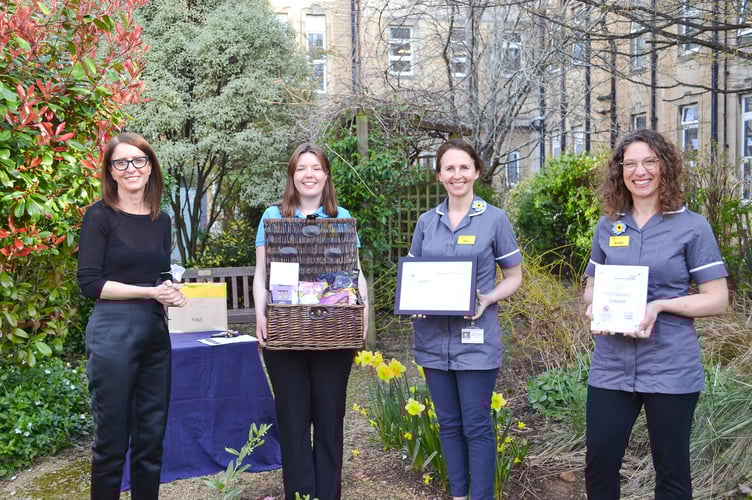 Dementia Care Team were presented with an award and gift basket from Chief Executive Cara Charles-Barks.