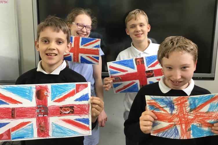 Pupils from Fosseway School with art works they have made to be displayed at the Town’s Jubilee events.