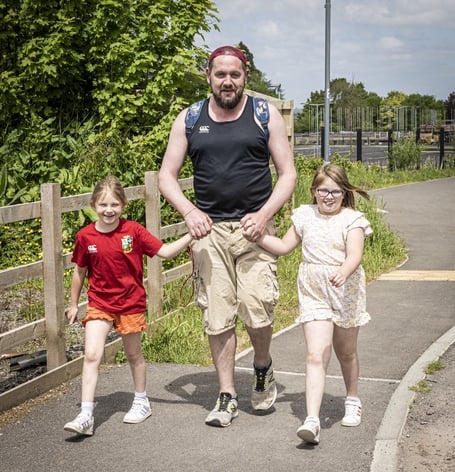 Dav Evans, Juniors Coach and Midsomer Norton Rugby Club, with two juniors team members. 
