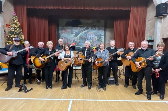 U3A Guitar Group will perform at Chilcompton Village Hall in June. 