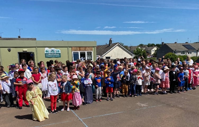 Shoscombe School children took part in a costume parade for the Queen. 