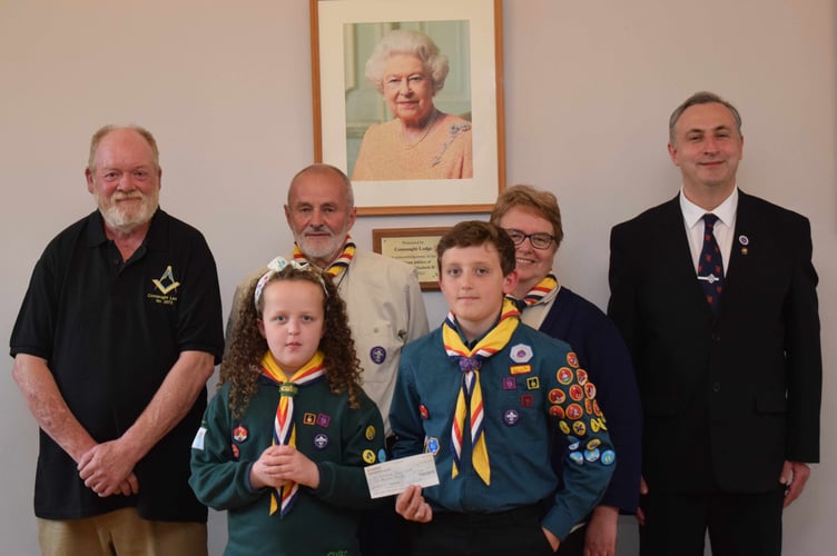 Past Master W. Bro Neil Arthur, Scout Leaders Dave and Janet Turner, Connaught Lodge Worshipful Master. Sister and brother, Cub Connie and Scout Quinn Hutchinson.