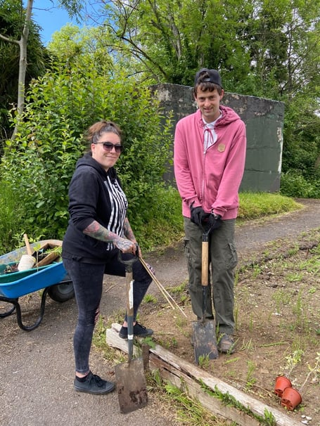 Sherrie and Elliott by the ‘Dig for Victory’ vegetable garden in Midsomer Norton Station.