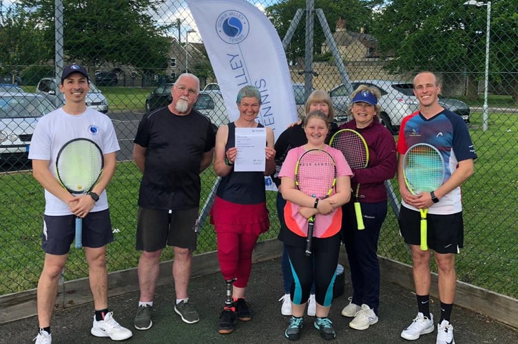 Members of Somer Valley Tennis Club celebrate becoming a charity. 