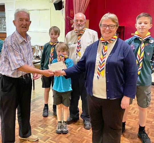 Paulton & District Skittle League donate £1,500 to three charities, including Radstock Scouts Group. 