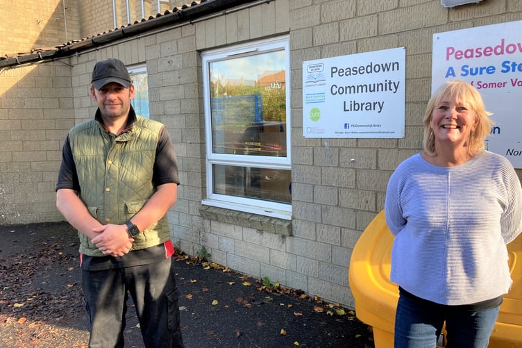 Gavin Heathcote and Cllr Karen Walker outside Peasedown St John Community Library.