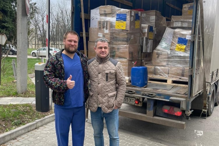 Hospital staff welcome the arrival of delivery number 8 from the UK to Ukraine. 