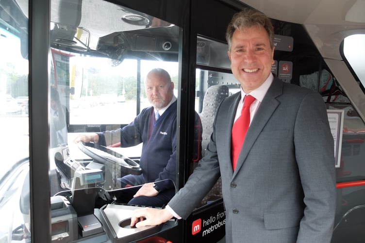 Metro Mayor Dan Norris stood with a bus driver in WECA. 