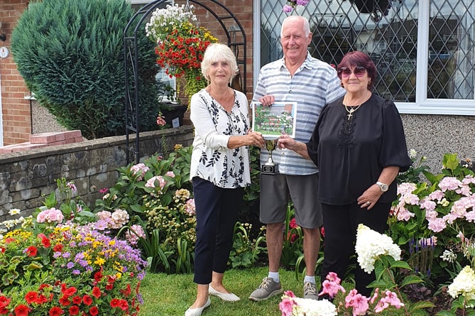 Mr and Mrs Holcombe of Waterside Road won for their strikingly beautiful front garden.