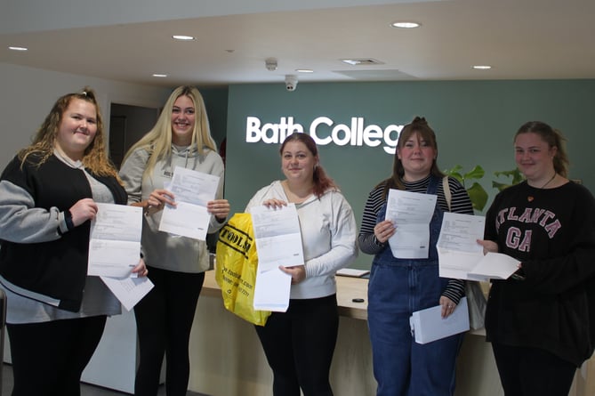 Childcare T Level students receiving their results. 