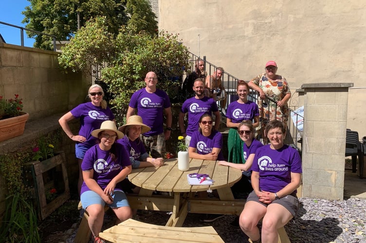Employees at Touchstone clubbed together to renovate Developing Health & Independence’s garden.