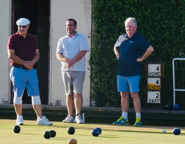 Neil Dalrymple CEO World Bowls, in all blue, with Paulton members Roger and Phil playing at Paulton Bowls Club.