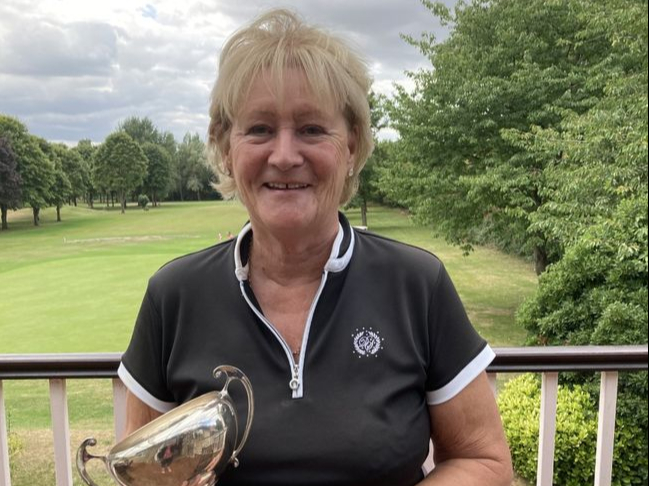 Glynis Slater wins the President's Trophy at Wells Golf Club.