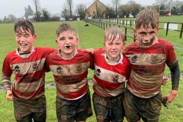 Midsomer Norton Rugby Club’s junior players pictured after a particularly muddy game!