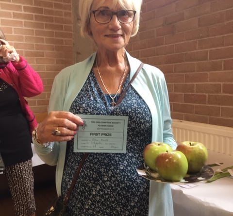 Photograph shows Joan Knott, who won first prize for her apples.