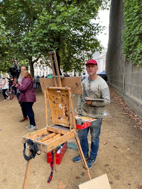 Pictured Peter Brown, a painter has travelled to London from his Somerset home to capture the capital in mourning for The Queen. See SWNS story SWNJartist. Peter Brown, 55, has been in London since Friday, painting the crowds along The Mall, in the parks and queueing along the Thmaes to see Her Majesty lying in State. As an expert in painting street scenes he is able to convey the bustling atmosphere across the city. Mr Brown, from Bath, said: With street scenes it is amazing to spend time on each one, so its not like 'click' and done. I want to really capture the moment and for that you need to take time.