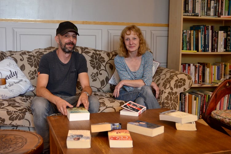 Tymon Emery and Jenny Clifford in Latte Lounge, behind PEOPLE charity shop. 
