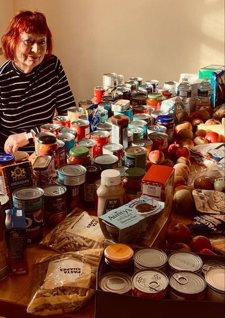Liz Hardman stood with a table full of donated goods set for Paulton Larder.