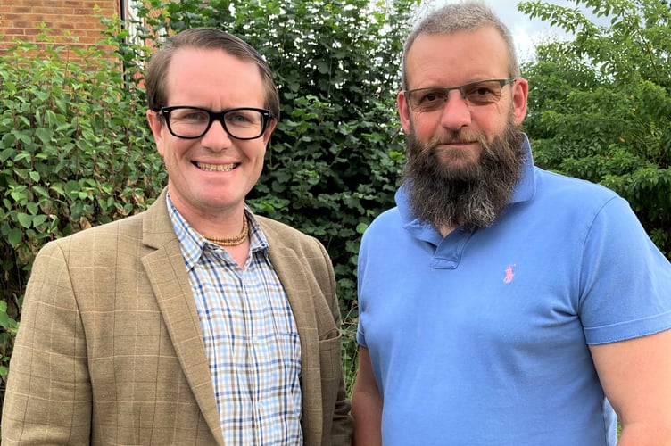 Nathan Hartley (left) steps down as chairman of Peasedown’s Party in the Park festival after 14 years and hands over the reigns to Gavin Heathcote (right).