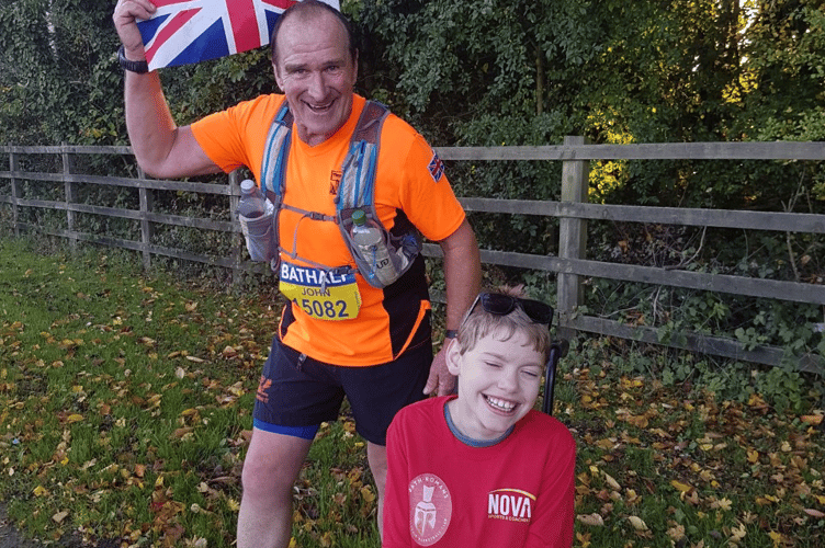 John Reynold’s with Henry Latchem, who he ran to raise money for. 