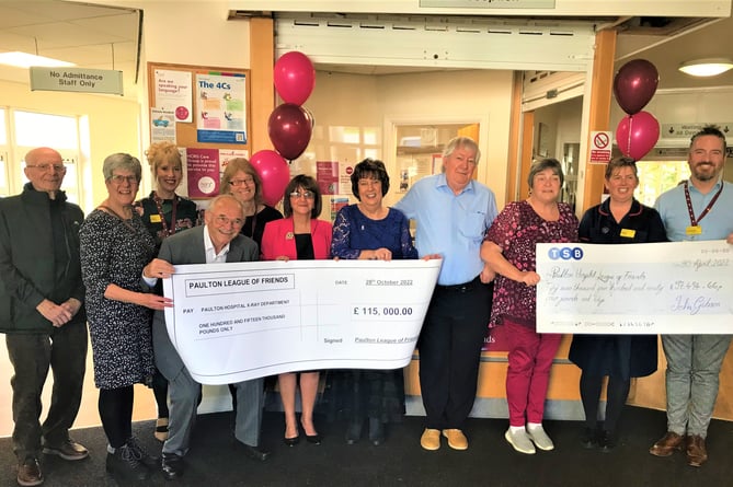 Members of the Paulton Hospital League of Friends presented cheques to management and staff of Paulton Hospital and HCRG Care Group to cover funding for a new X-ray machine. Also included in the picture are Lana and John Gibson,  nephew and niece of local man Ray Ashman who left a substantial legacy to the hospital.