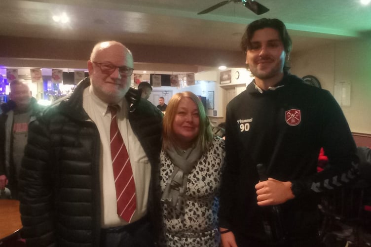Dan Dempsey receiving his Man of the Match award against Sholing on Saturday from match sponsor VIATEC of Westfield Trading Estate Sales Manager Cathy Metcalf with PRFC chairman Dave Bissex.