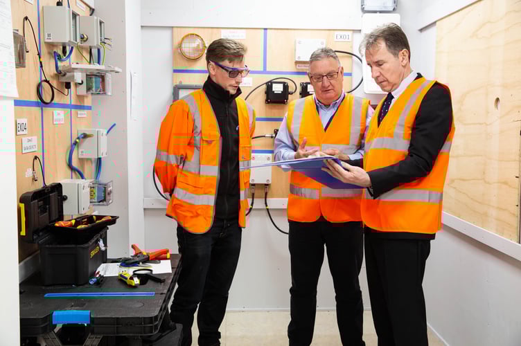 (Left to right) Paul Whittaker-Measor (training course learner), Mayor Norris and Steve Spencer (health and safety Director at Bridges).