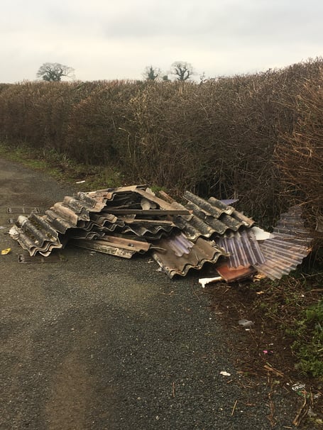 Asbestos sheets have been left in Radstock. 