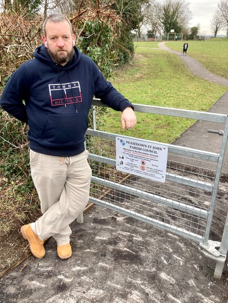 Gavin Heathcote next to Peasedown St John Recreation Ground where cracks in the £90,000 surface have appeared recently.