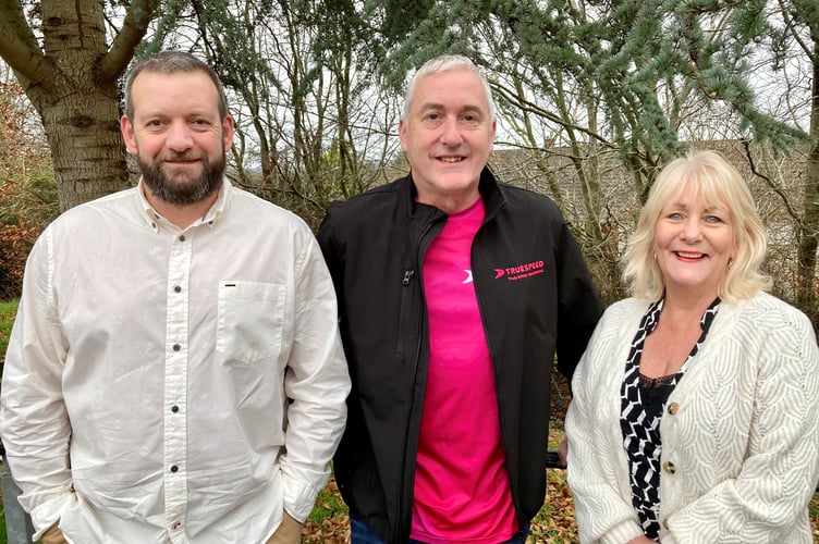 Truespeed Head of Residential Sales Neil Rogers (centre) and Party in the Park’s Festival Managers Gavin Heathcote and Karen Walker.