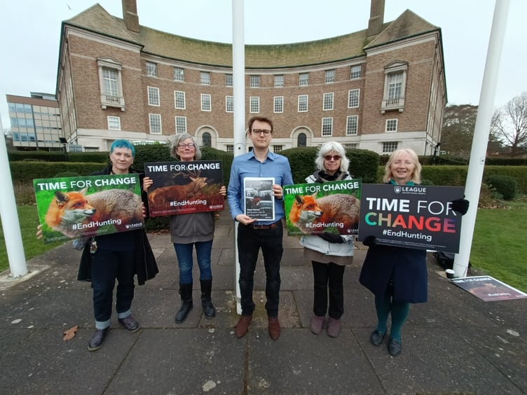 League Against Cruel Sports public affairs officer Jac Freeman (blue shirt in centre) and League campaigners handing in the letter and report at County Hall in Taunton today.