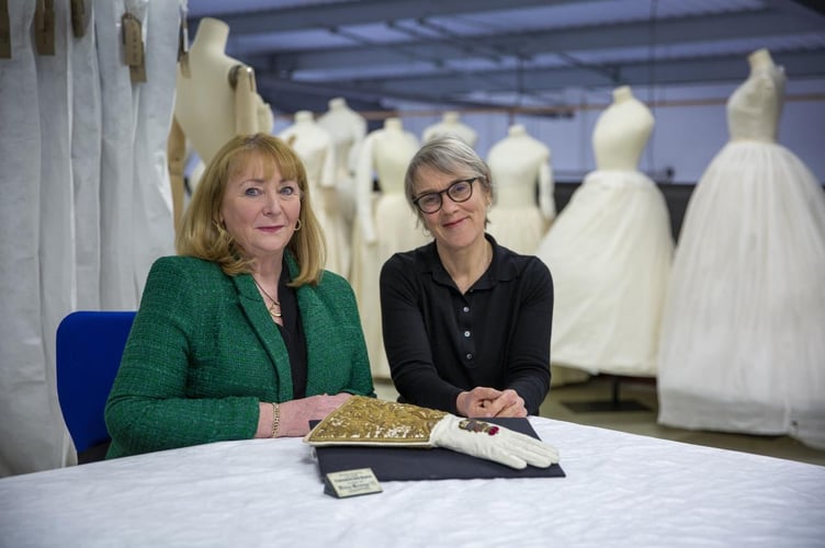 Deborah Moore, CEO of Dents, with Rosemary Harden, Fashion Museum Manager.