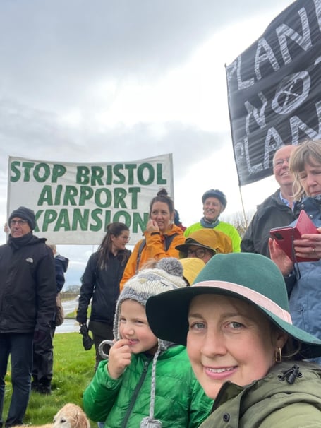 Green Party group leader Bridget Petty (front right) with protestors against expansion of the airport.