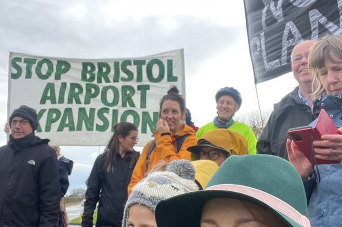 Green Party group leader Bridget Petty (front right) with protestors against expansion of the airport.