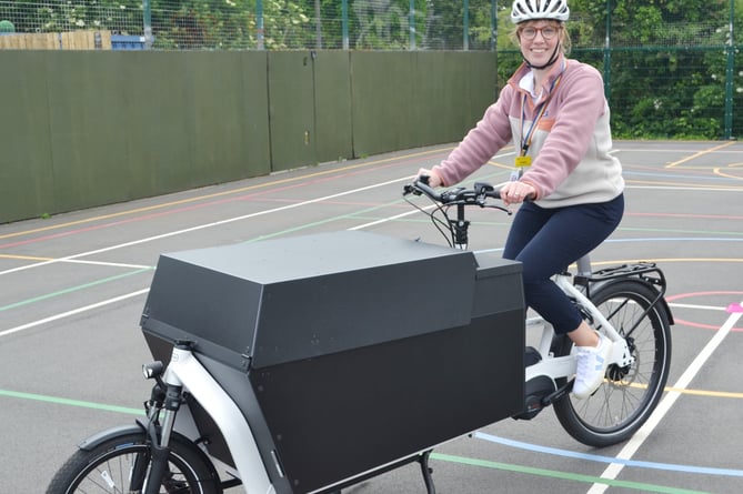 Annelore Hill-Verhaegen, a Specialist Occupational Therapist in the Children’s Therapies Team, on the new bike.