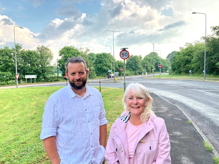 Cllr Gavin Heathcote (left) and Cllr Karen Walker (right) at A367/Bath Road junction where a new roundabout is to be built.