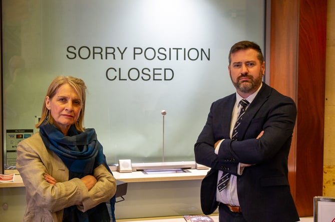 Bath MP Wera Hobhouse (left) and leader of Bath and North East Somerset Council Kevin Guy (right) at a closed ticket office booth at Bath Spa station.