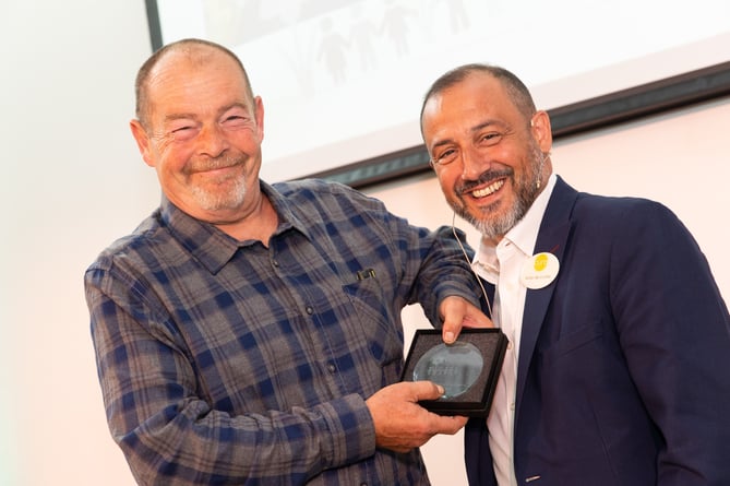 Pictured: Steve Hartley, winner of this year's Community Hero of the Year Award (left), with Curo's Chief Executive Victor da Cunha