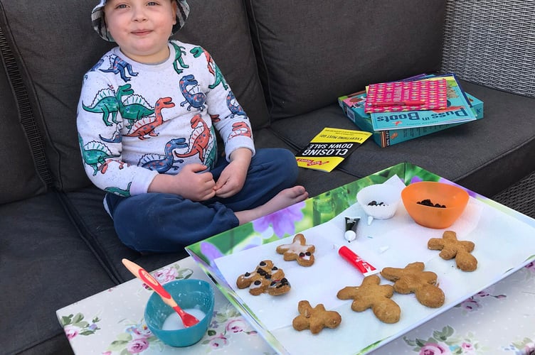 This picture shows George at Christmas 2020, after his initial intensive treatment, when he started maintenance chemotherapy.