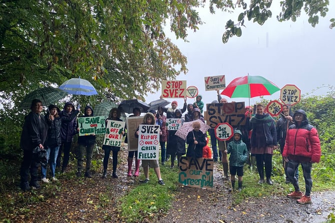 Locals braved rainy weather to protest at the site.