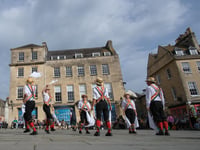 Local dancers celebrate... by taking over the city!