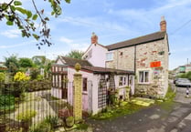 Character cottage for sale is 200 years old and sits beside a brook 