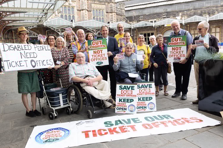 Dan Norris and protesters outside ticket office