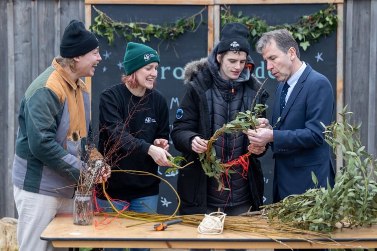 Mayor Norris making a wildlife friendly Christmas wreatn with Avon Wildlife Trust