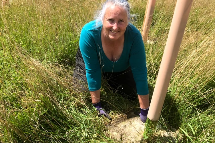Jackie Head planting trees in the Great Avon Wood.